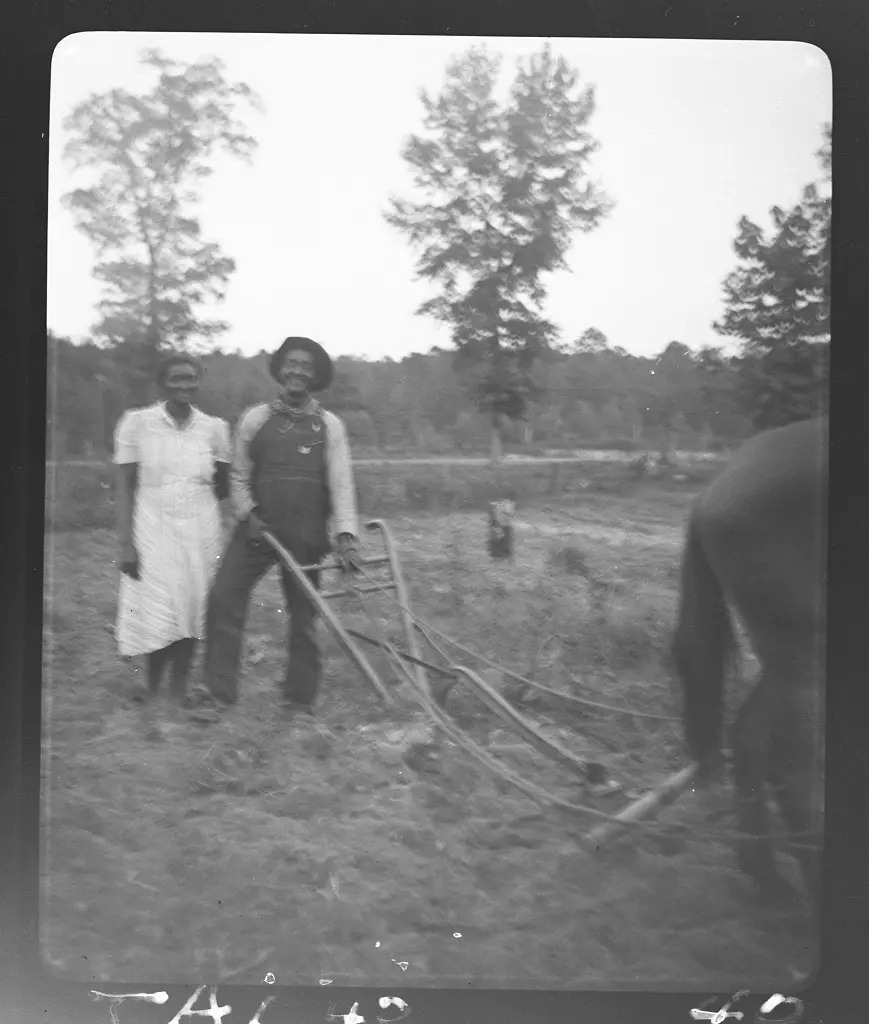 Henry Truvillion and wife, in his garden, Rt. #1, Newton, Texas
